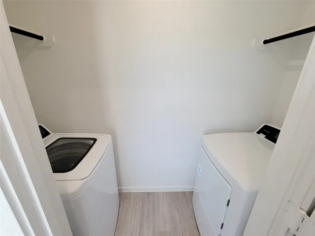 a view of house with backyard