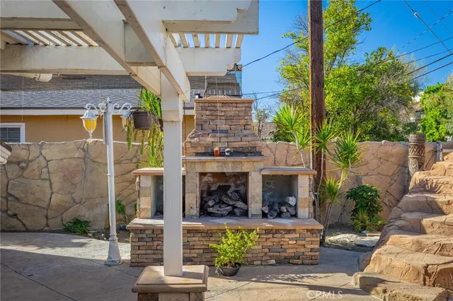 a view of table and chairs in patio