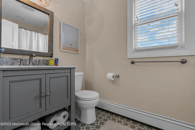 a bathroom with bathtub and shower