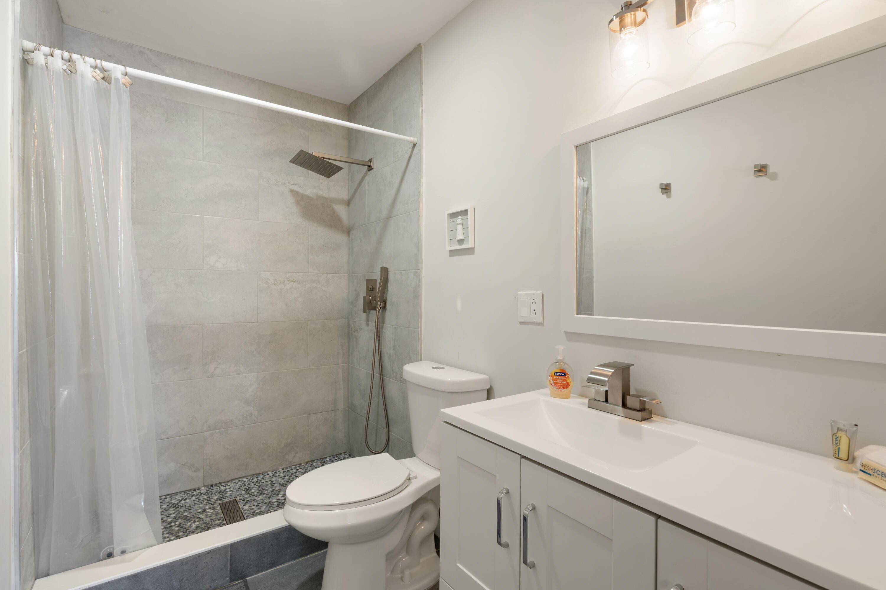 98302 Windward Avenue Key Largo, FL 33037 - Photo 11 of 35 a bathroom with a sink toilet and shower