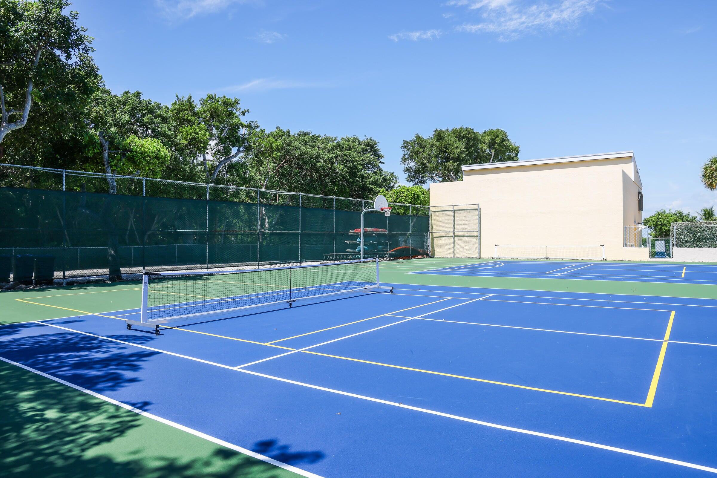 98302 Windward Avenue Key Largo, FL 33037 - Photo 30 of 35 a view of a tennis court