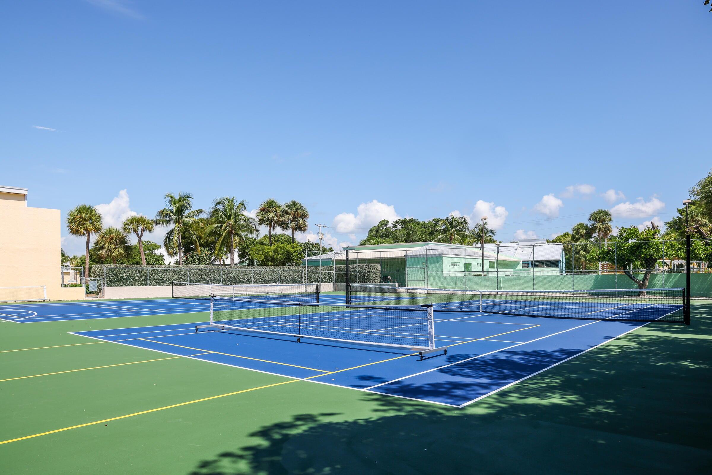 98302 Windward Avenue Key Largo, FL 33037 - Photo 31 of 35 a view of an outdoor space and tennis court
