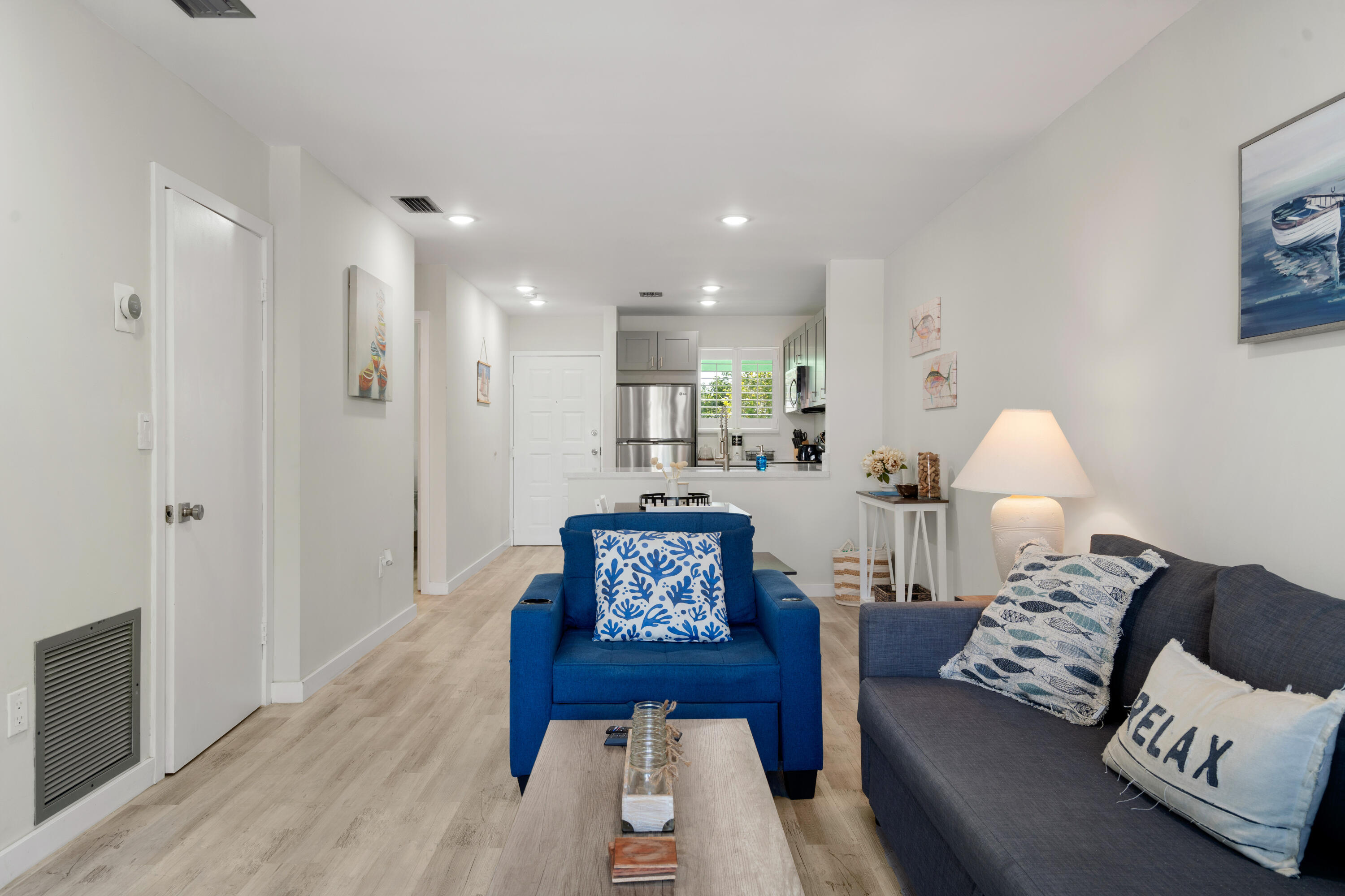 98302 Windward Avenue Key Largo, FL 33037 - Photo 6 of 35 a living room with furniture and a wooden floor