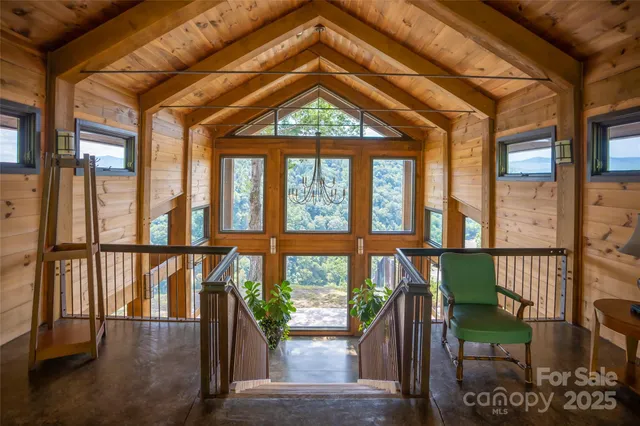 a kitchen with a stove a counter space a sink and cabinets