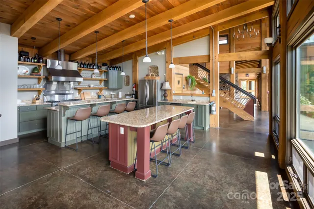 a room with furniture and wooden floor