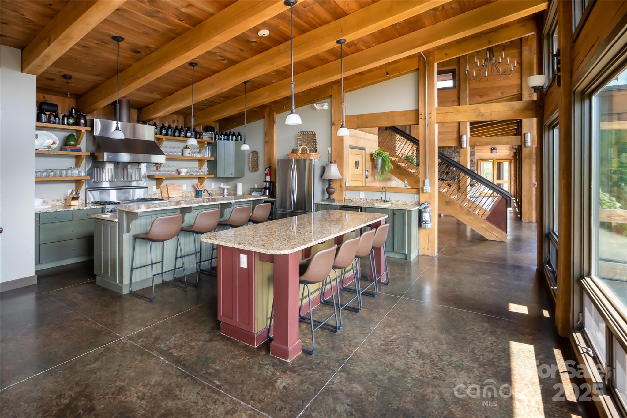 101 Red Maple Run, Unit 1 Marshall, NC 28753 - Photo 16 of 45 a kitchen with a stove a counter space a sink and cabinets