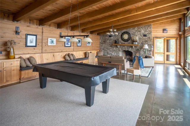 a living room with furniture and a table