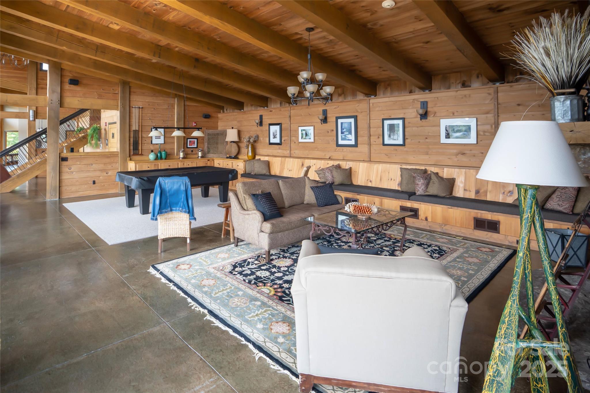 101 Red Maple Run, Unit 1 Marshall, NC 28753 - Photo 18 of 45 a living room with furniture and a table