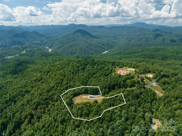 a view of a chair and a small yard