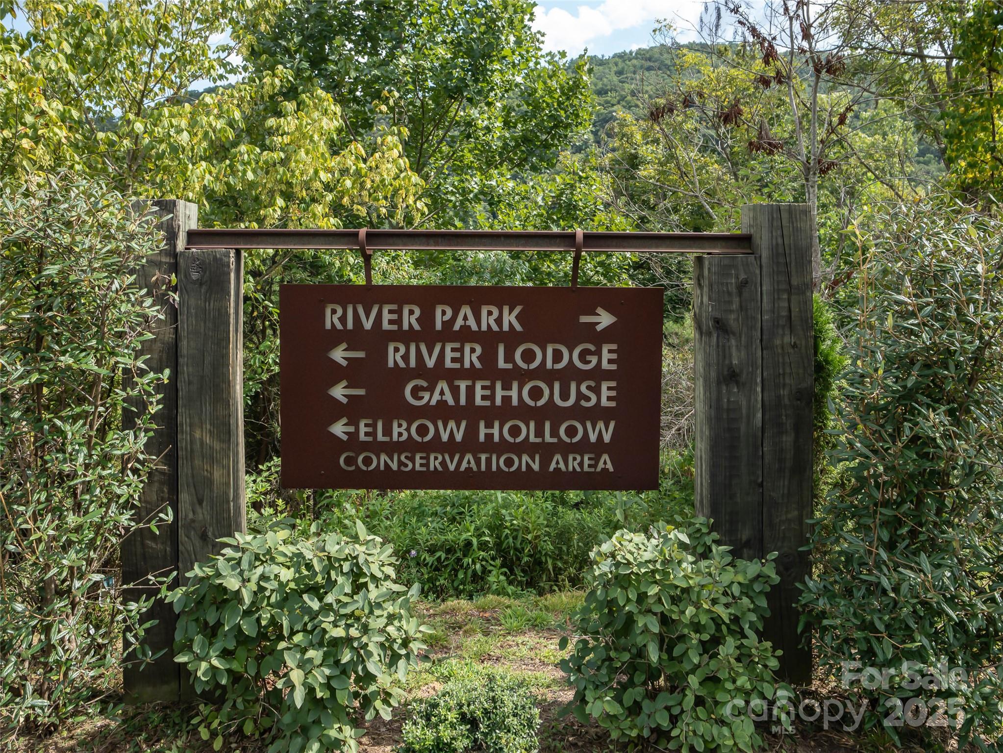 101 Red Maple Run, Unit 1 Marshall, NC 28753 - Photo 35 of 45 a sign on the side of the building
