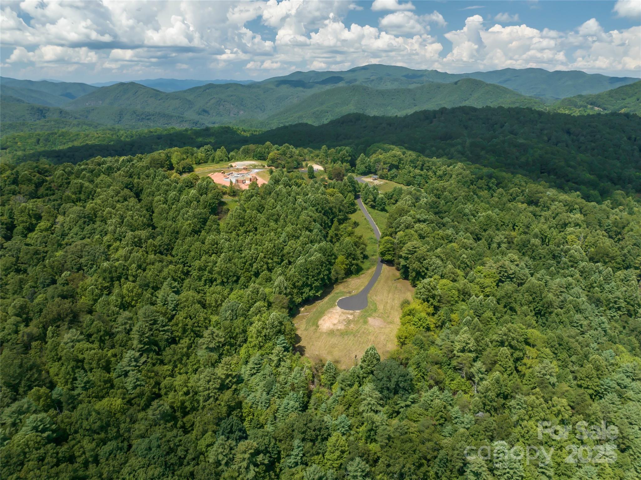 101 Red Maple Run, Unit 1 Marshall, NC 28753 - Photo 36 of 45 a view of a lake from a yard