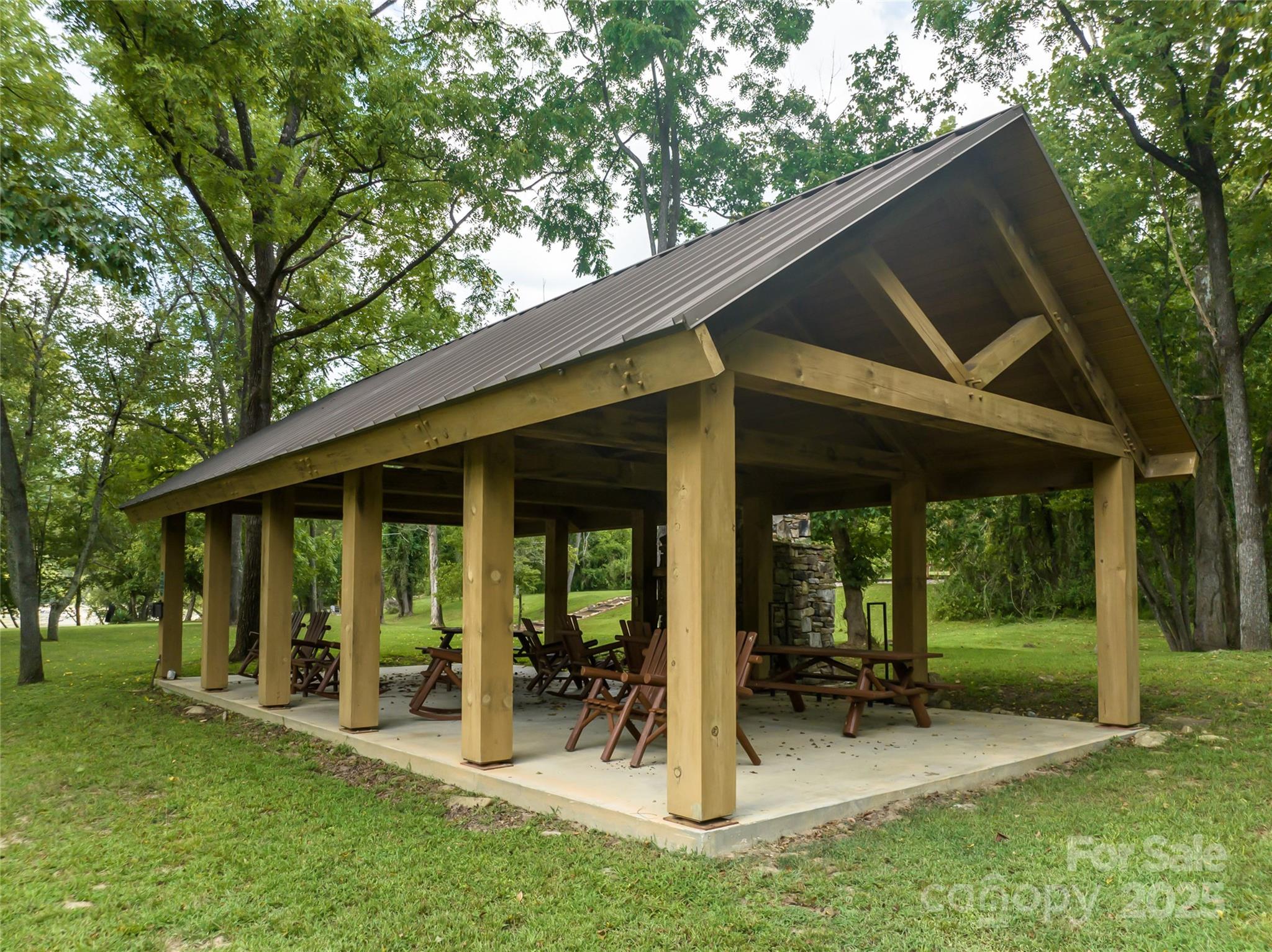 101 Red Maple Run, Unit 1 Marshall, NC 28753 - Photo 44 of 45 a view of a chair and table in backyard of the house