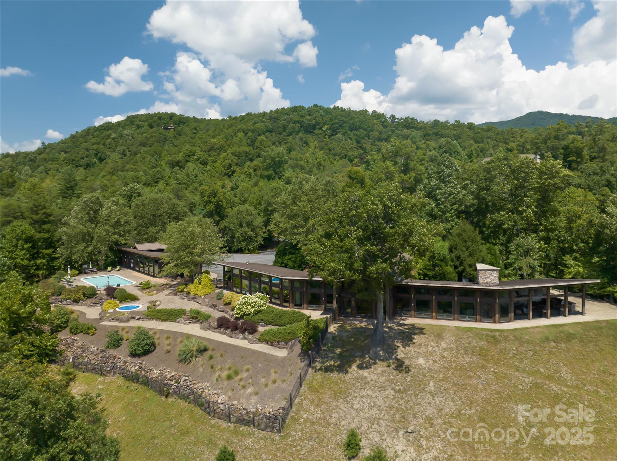 101 Red Maple Run, Unit 1 Marshall, NC 28753 - Photo 7 of 45 a view of a house with a yard