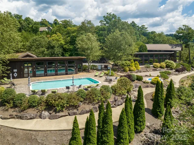 a view of a swimming pool with a patio