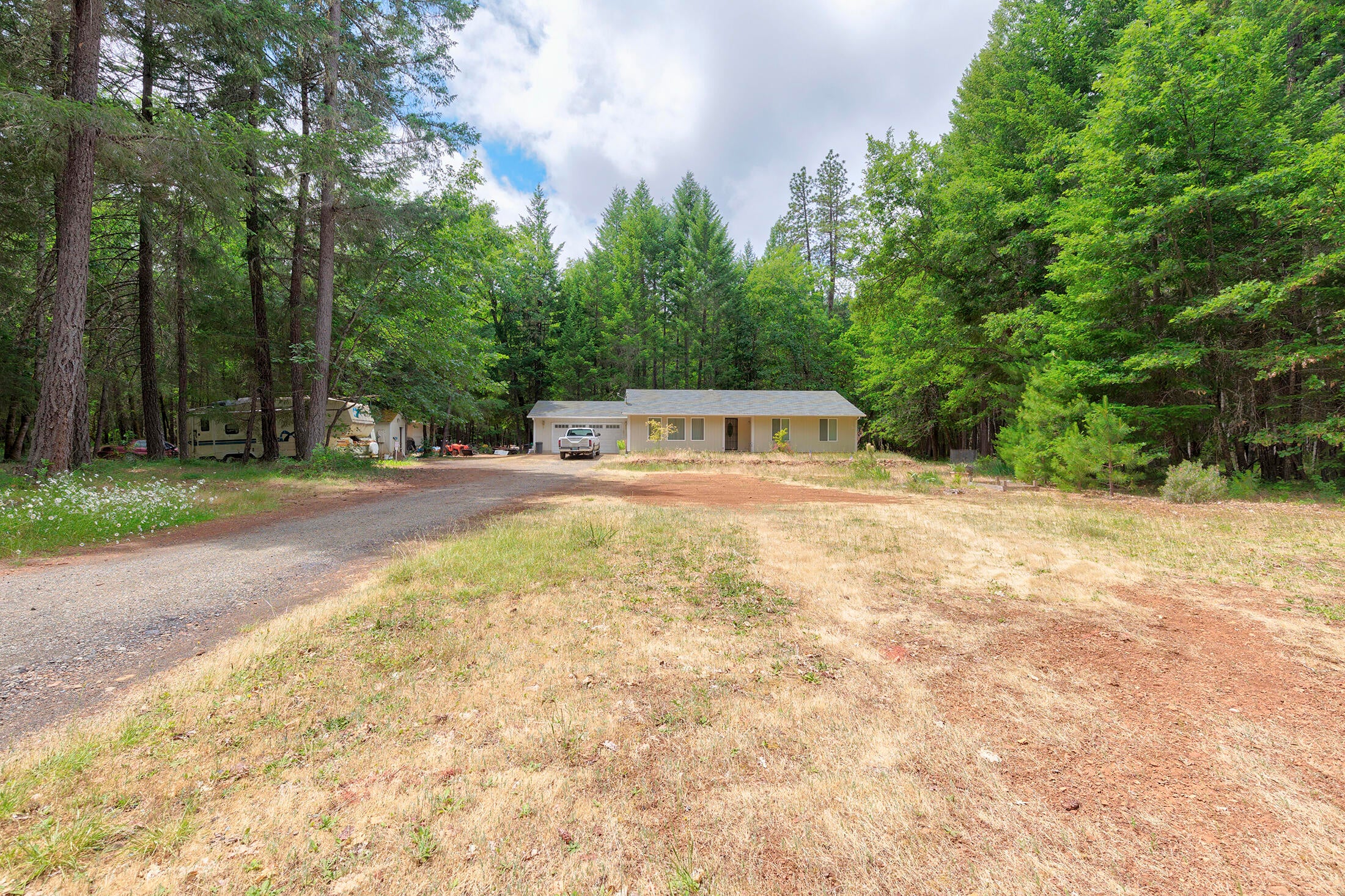 7060 Rockydale Road Cave Junction, OR 97523 - Photo 24 of 33 sits back off the road for privacy