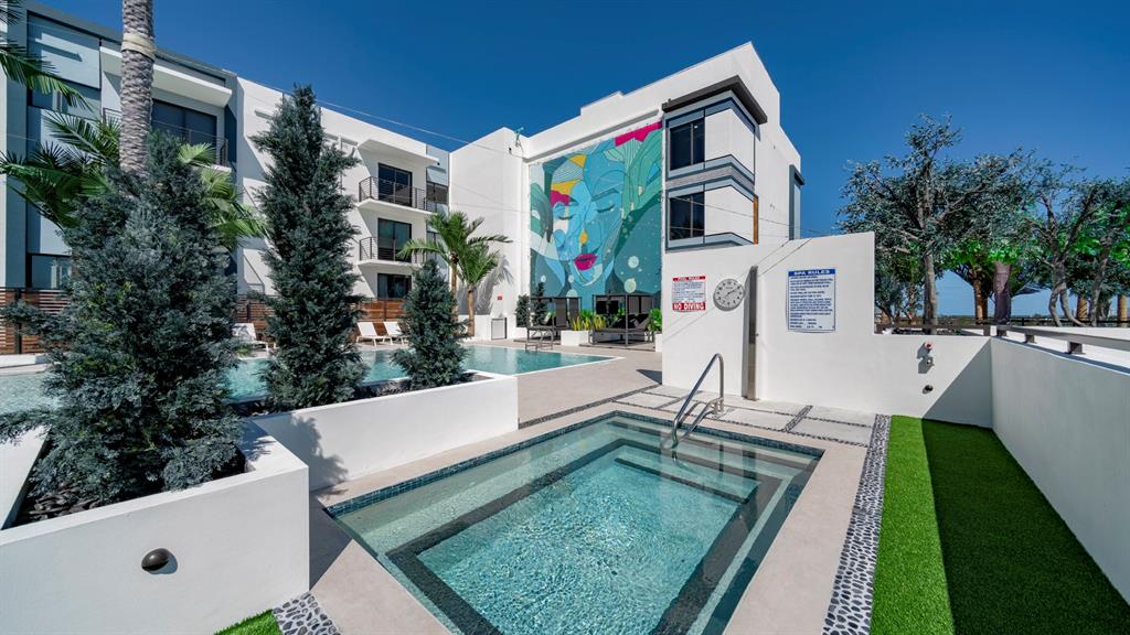 425-475 East Atlantic Boulevard, Unit 510 Pompano Beach, FL 33060 - Photo 14 of 35 a view of swimming pool with chairs