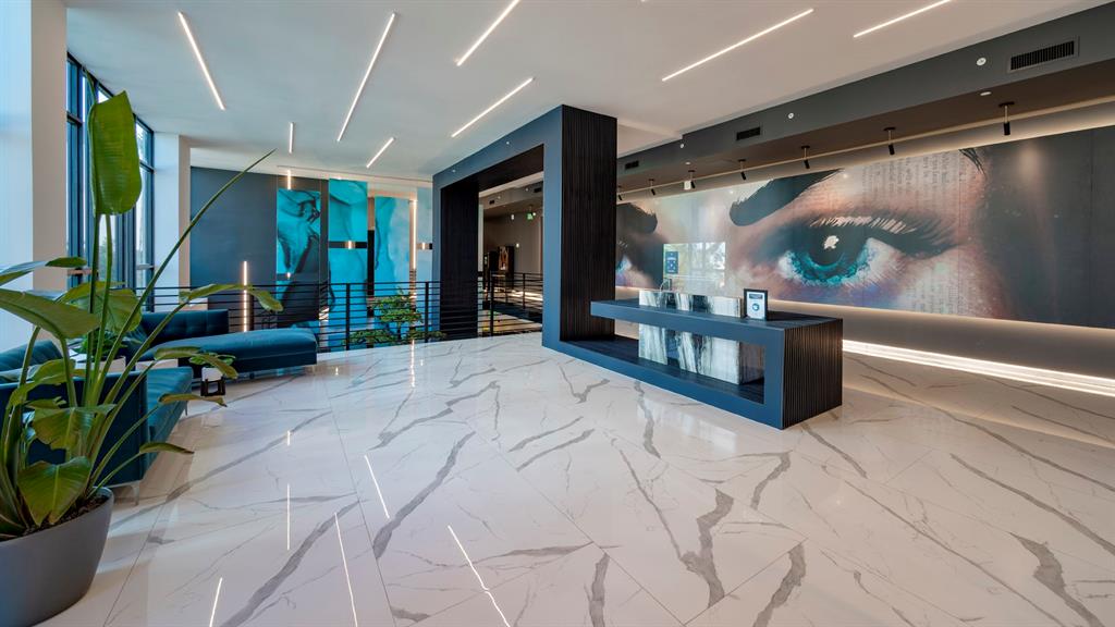 425-475 East Atlantic Boulevard, Unit 510 Pompano Beach, FL 33060 - Photo 16 of 35 a lobby with furniture and potted plant