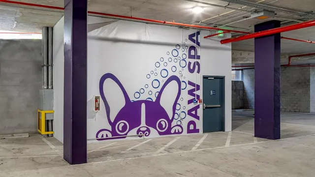 a view of living room with fireplace furniture and a large window