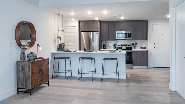 a bathroom with a sink and mirror