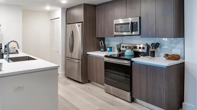 a bedroom with a bed and a cabinets