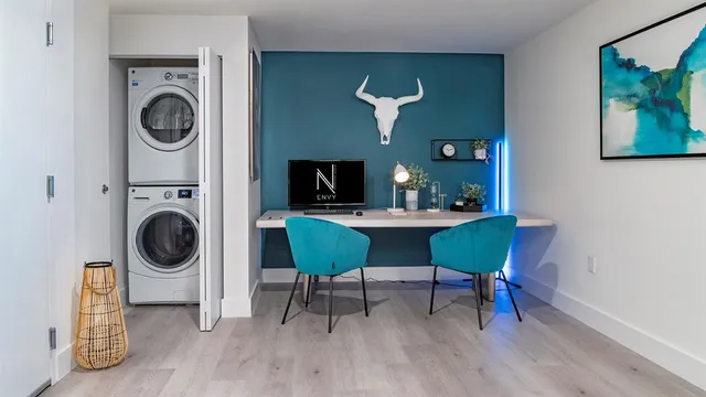 a kitchen with a sink and a potted plants