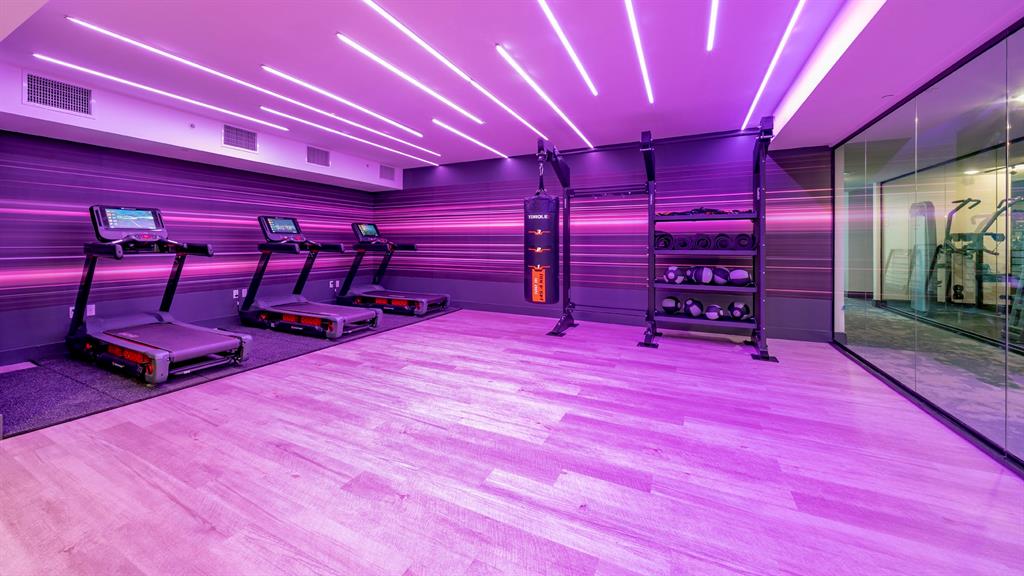 425-475 East Atlantic Boulevard, Unit 510 Pompano Beach, FL 33060 - Photo 34 of 35 a room with gym equipment