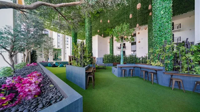 an aerial view of a house with outdoor space