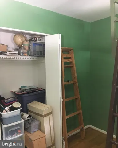 a room with cabinets and a wooden floor