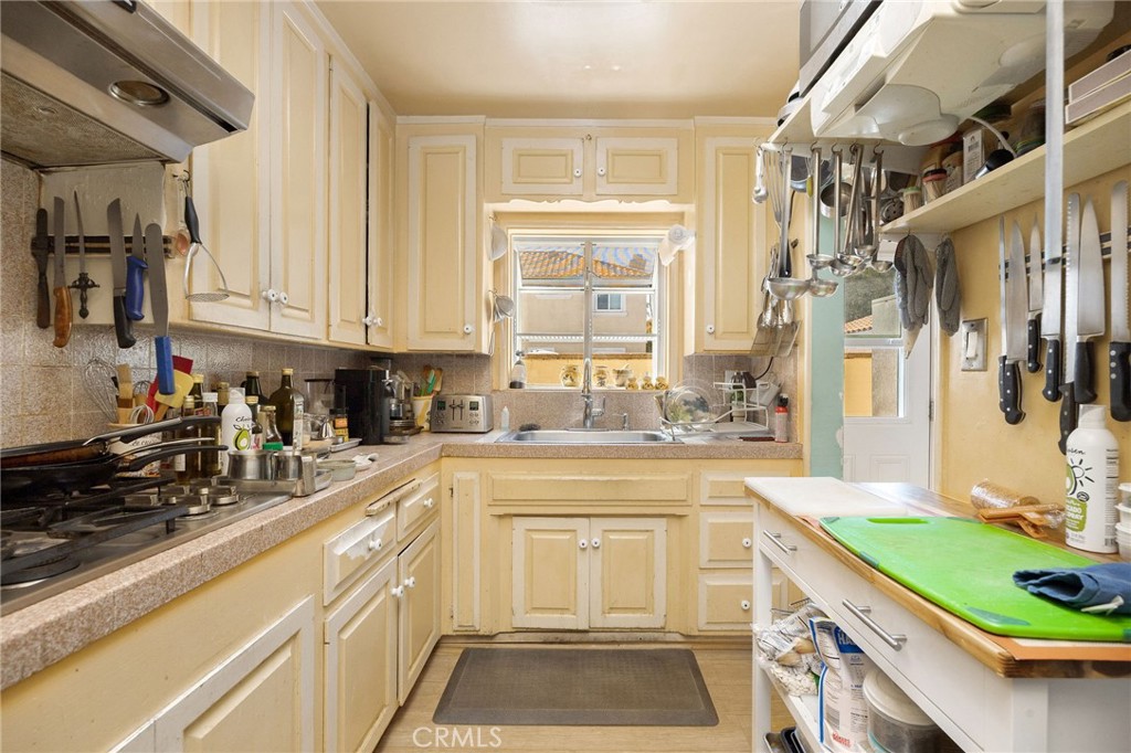2905 Rindge Lane Redondo Beach, CA 90278 - Photo 9 of 26 a kitchen with stainless steel appliances granite countertop a sink and cabinets