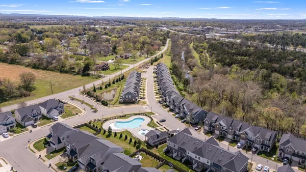 swimming pool view with sitting space