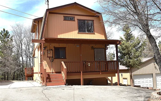 a front view of a house with a garage