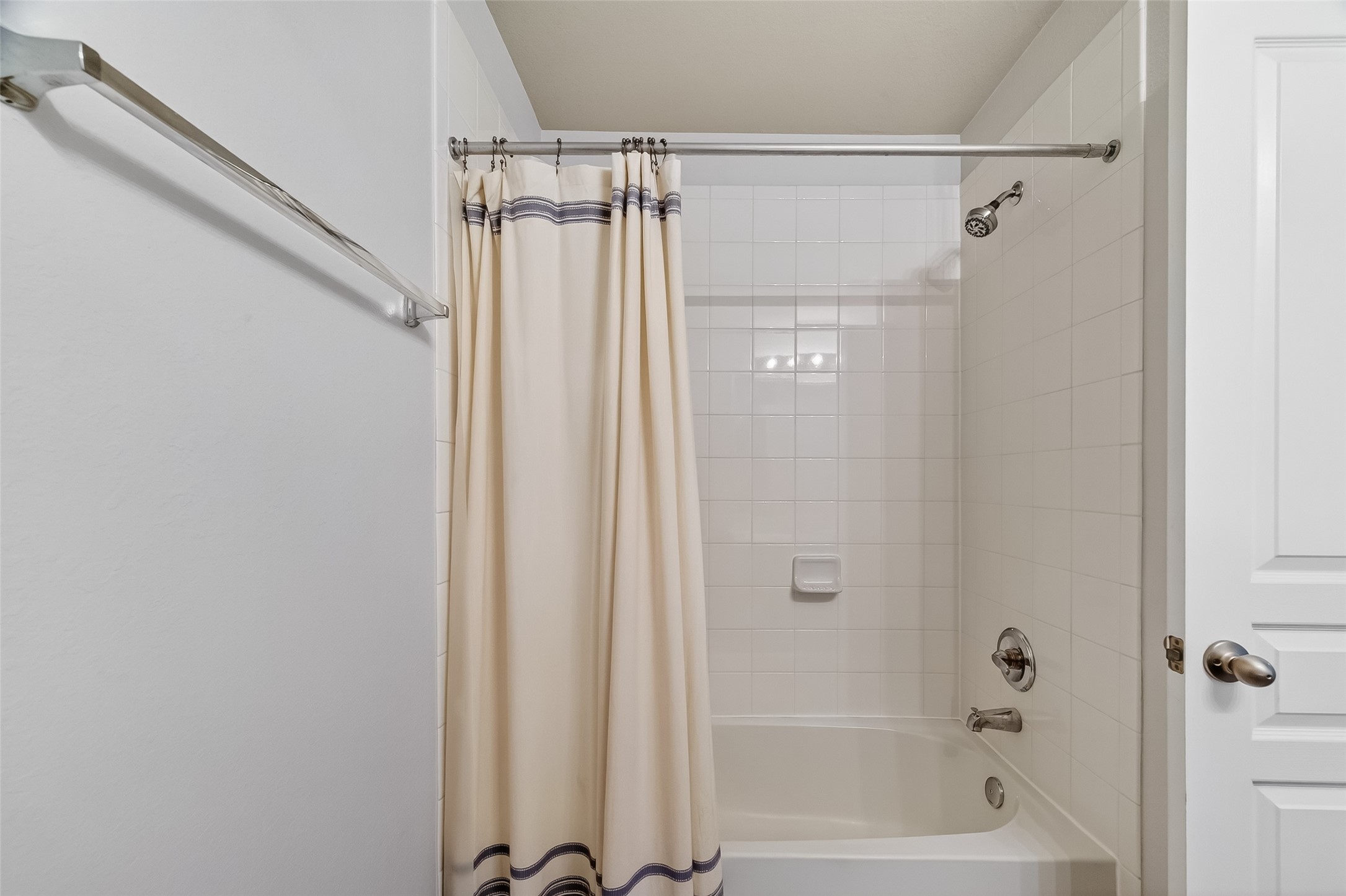 8630 Willet Street Baytown, TX 77521 - Photo 30 of 48 a bathroom with a shower