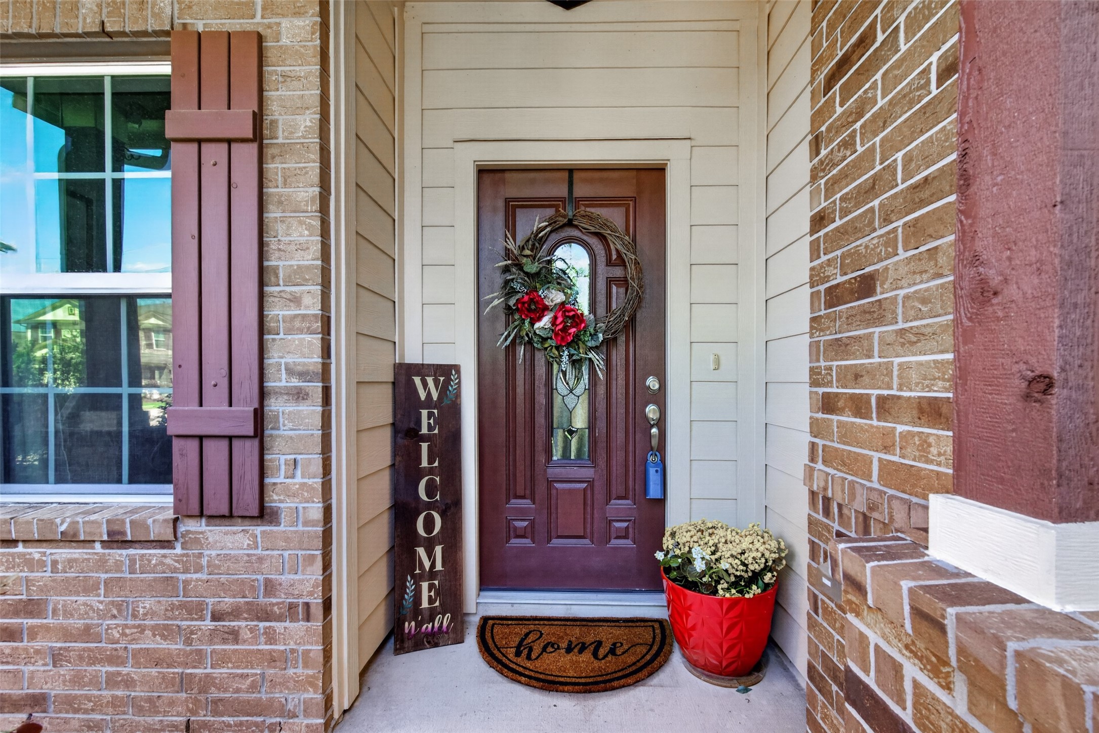 8630 Willet Street Baytown, TX 77521 - Photo 3 of 48 a front view of a house with a yard