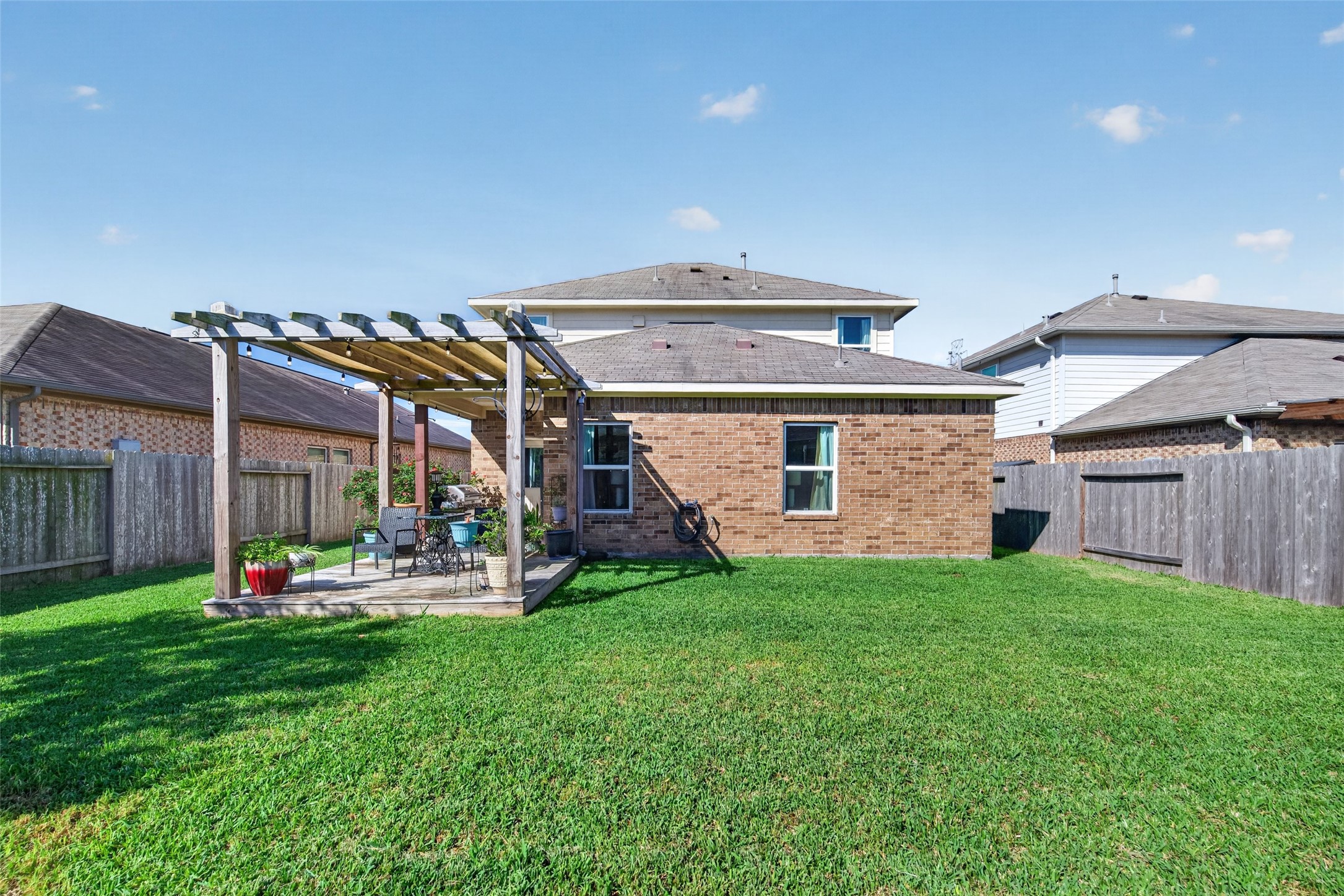 8630 Willet Street Baytown, TX 77521 - Photo 45 of 48 rear view of home