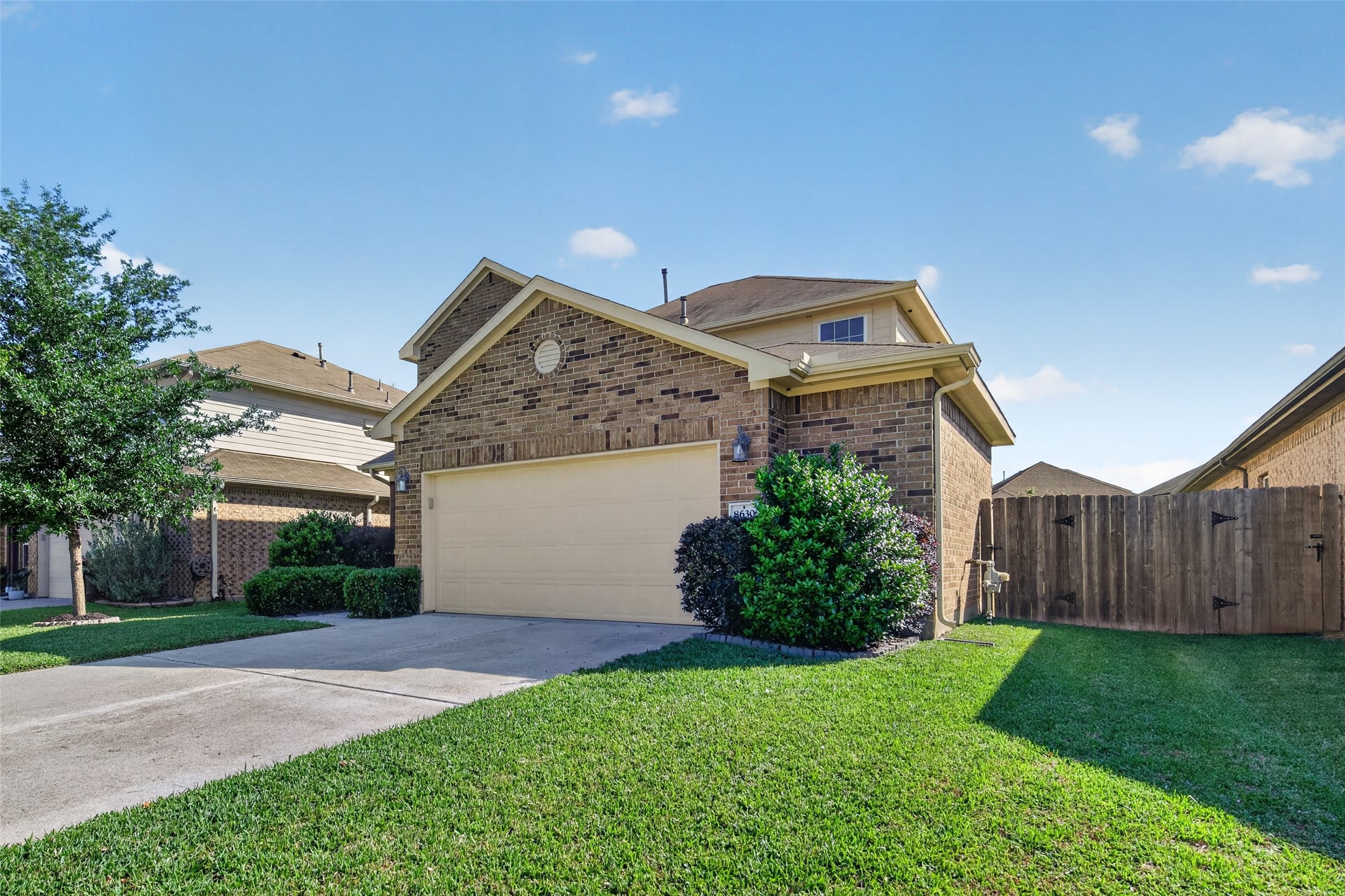 8630 Willet Street Baytown, TX 77521 - Photo 48 of 48 a front view of house with yard and green space