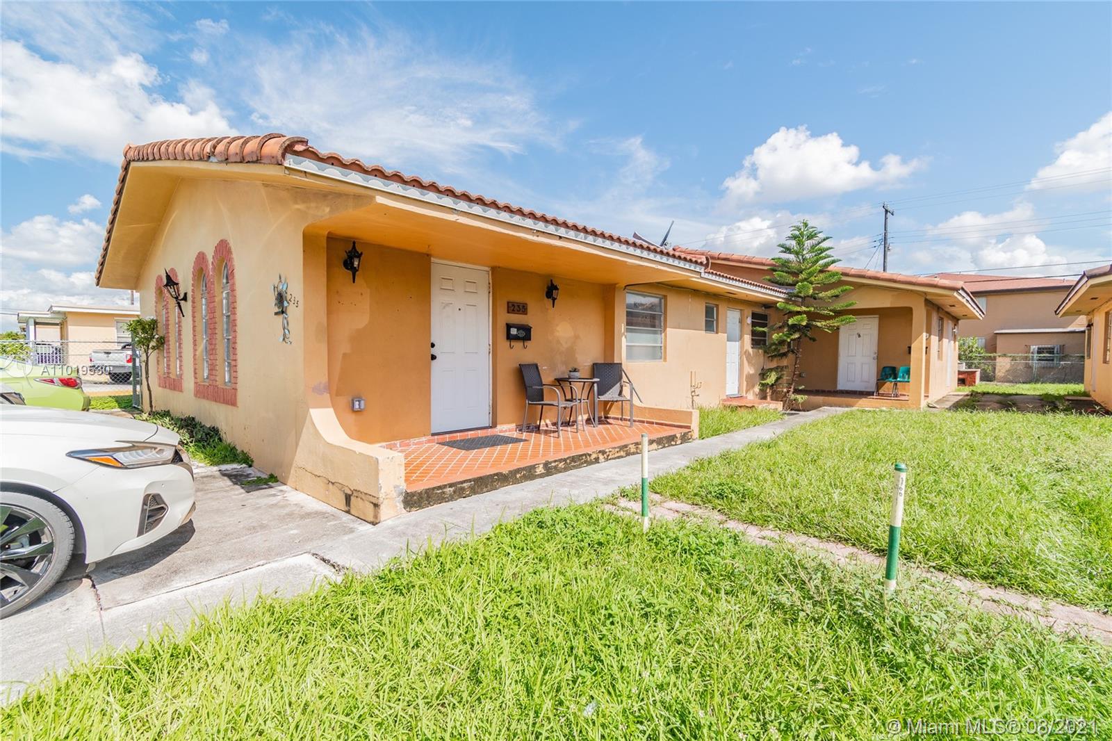 Hialeah Acres Hialeah, FL 33010 - Photo 19 of 45 a front view of a house with garden