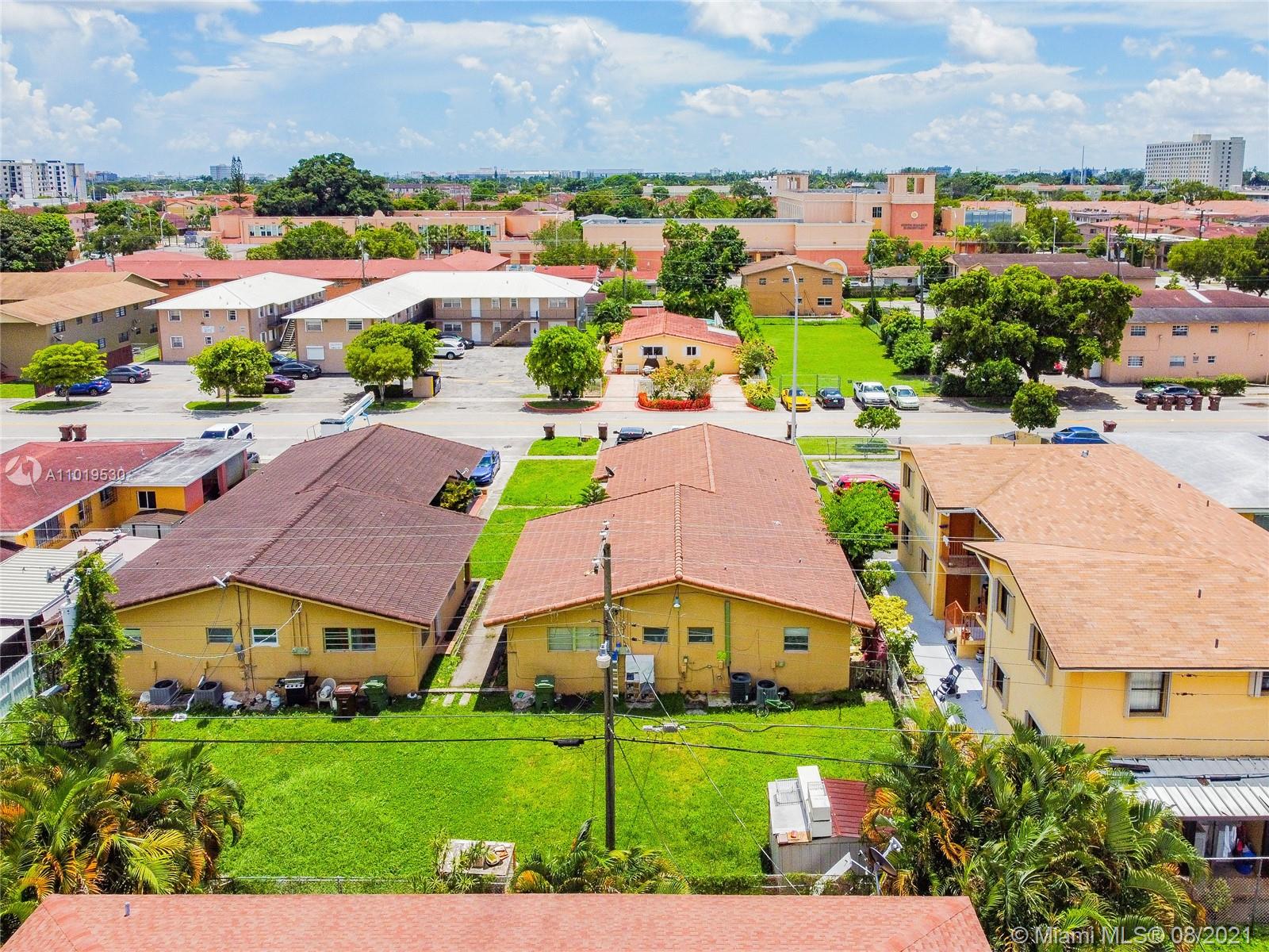 Hialeah Acres Hialeah, FL 33010 - Photo 3 of 45 an aerial view of multiple houses with yard