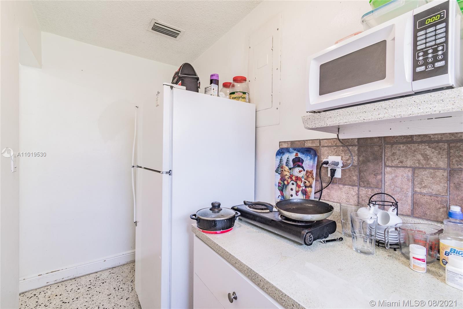 Hialeah Acres Hialeah, FL 33010 - Photo 22 of 45 a room with storage and utility