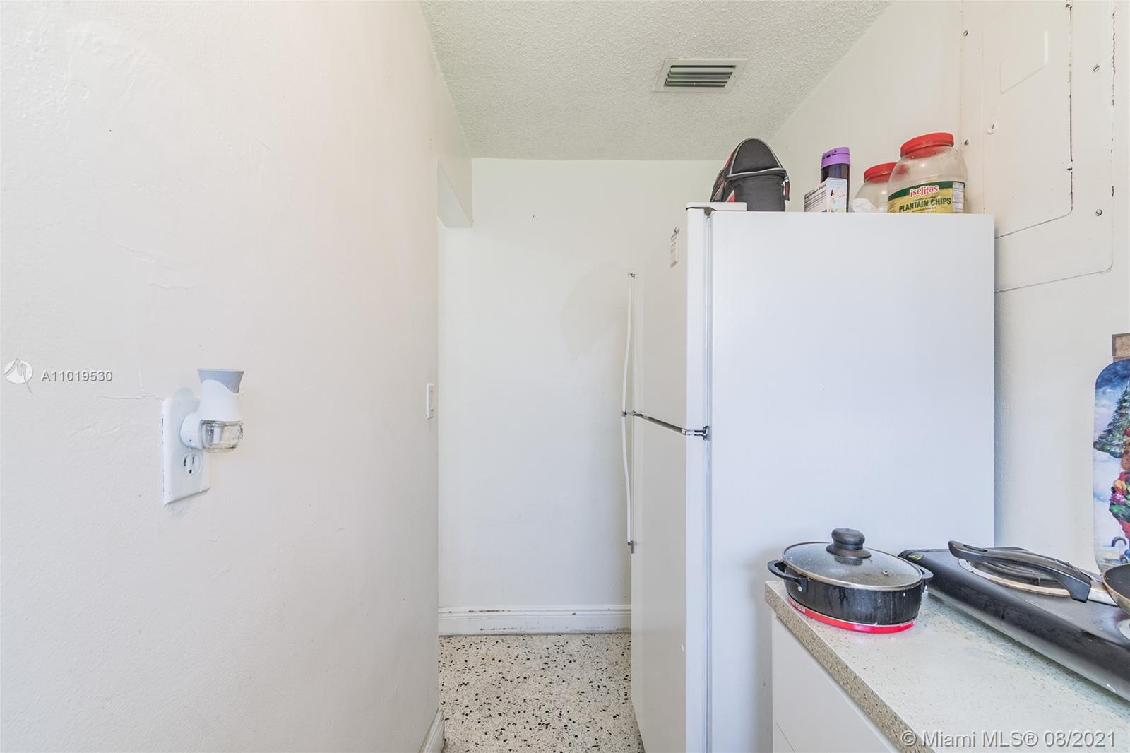 Hialeah Acres Hialeah, FL 33010 - Photo 23 of 45 a room with storage and utility