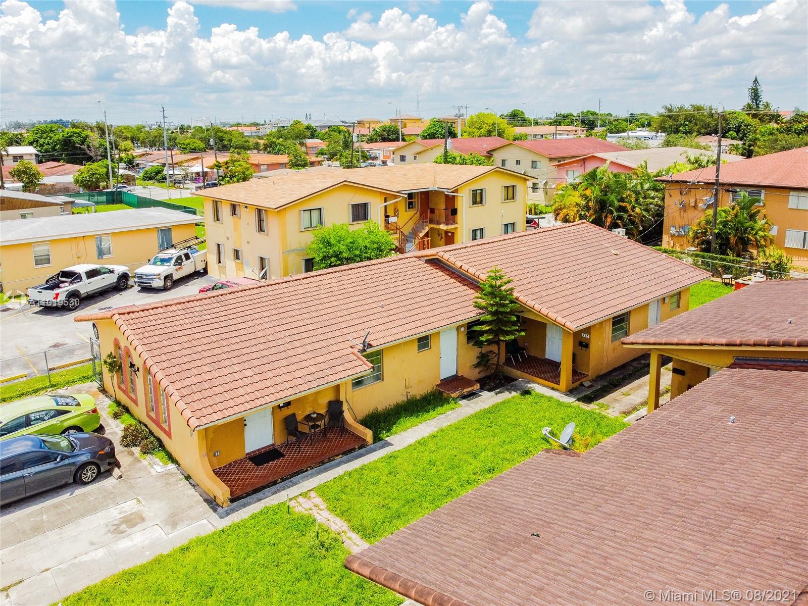 Hialeah Acres Hialeah, FL 33010 - Photo 35 of 45 a aerial view of a house with swimming pool and a chairs