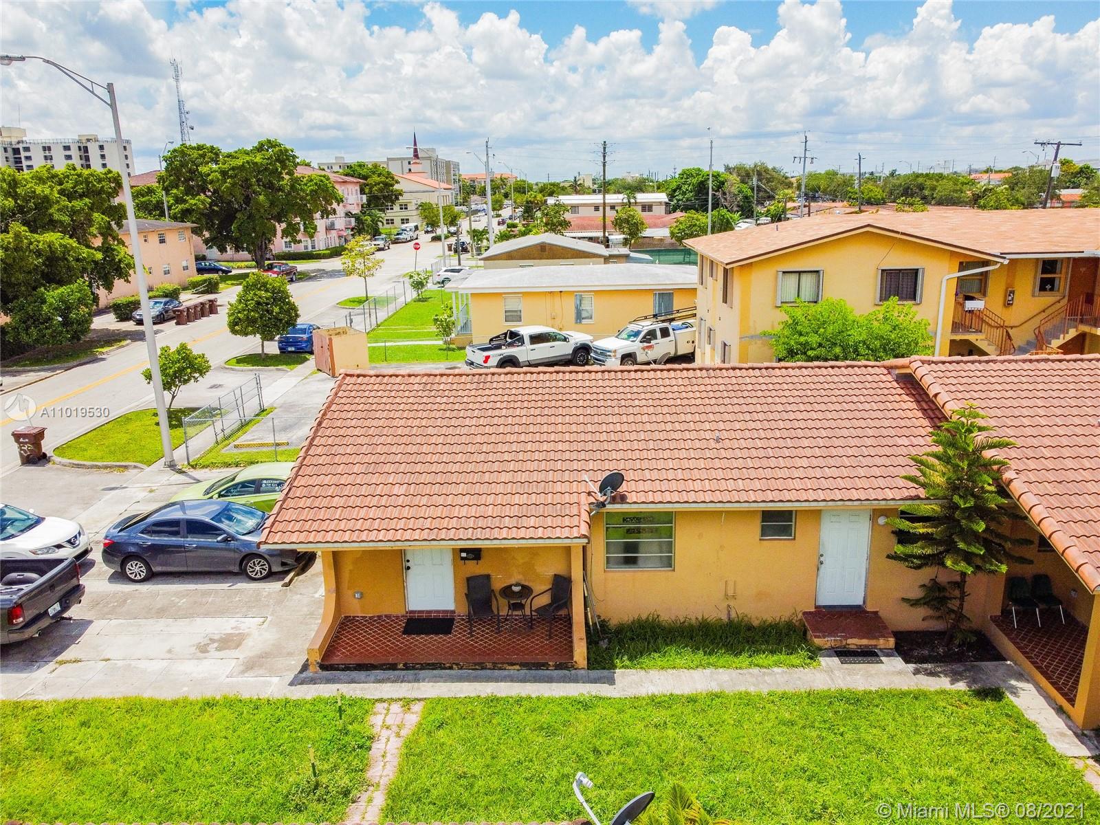 Hialeah Acres Hialeah, FL 33010 - Photo 36 of 45 a front view of a house with garden