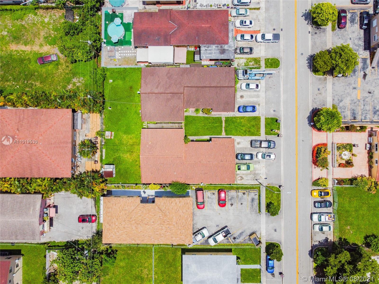 Hialeah Acres Hialeah, FL 33010 - Photo 37 of 45 an aerial view of multiple houses with yard