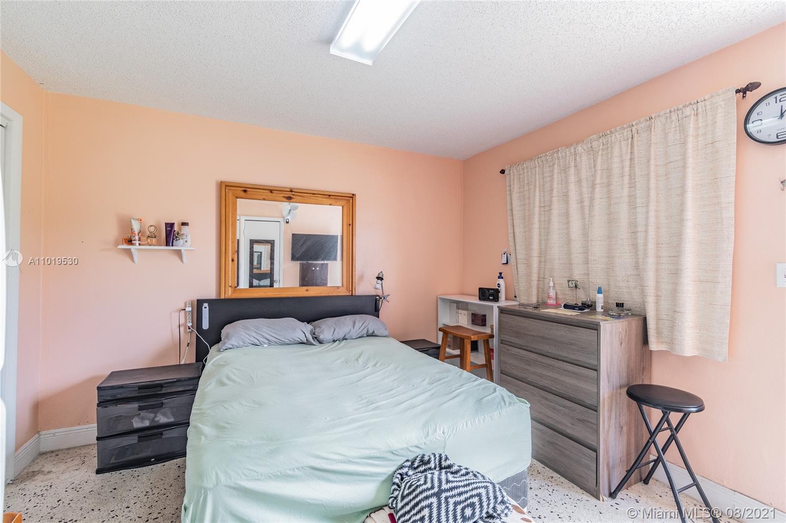 Hialeah Acres Hialeah, FL 33010 - Photo 44 of 45 a bedroom with a bed and a window