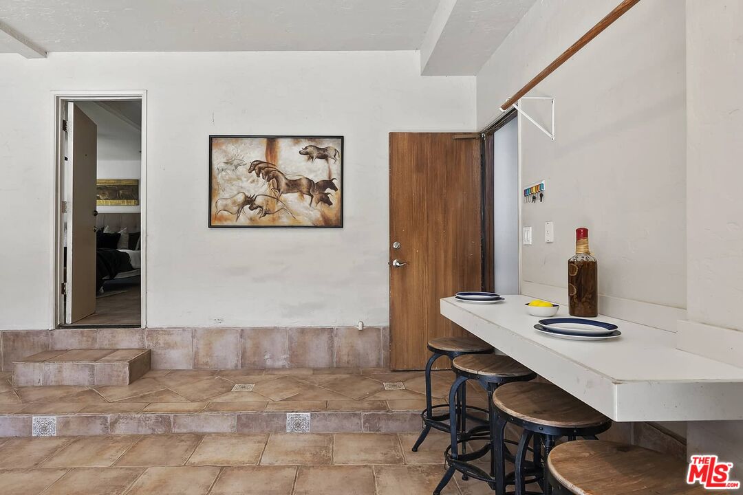 2437 Stokes Canyon Road Calabasas, CA 91302 - Photo 26 of 60 a view of a workspace with furniture