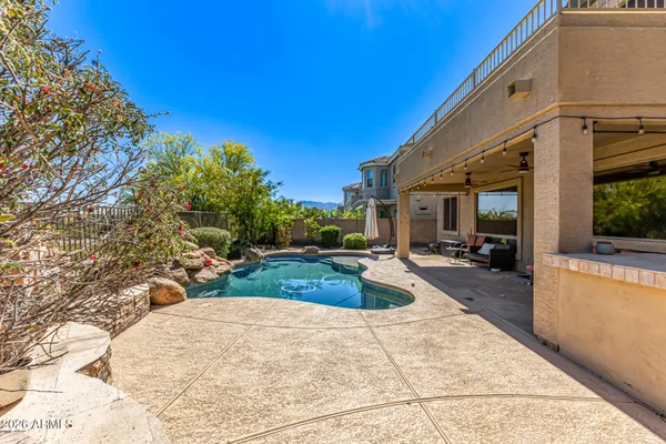 a view of a backyard and porch