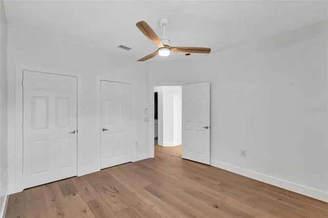a view of a hallway with staircase