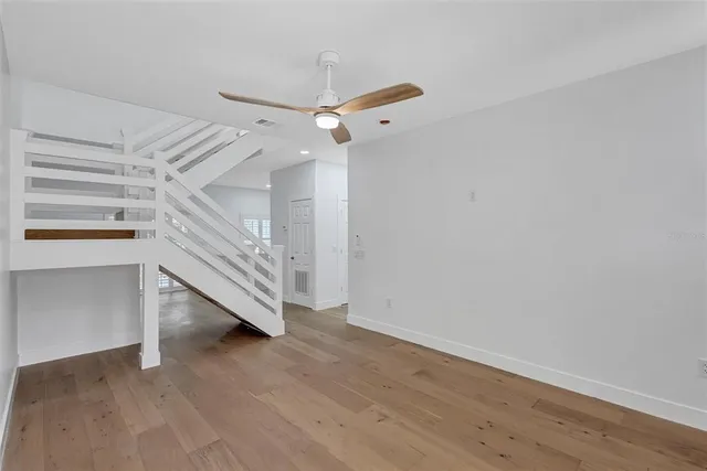 a view of a hallway with staircase