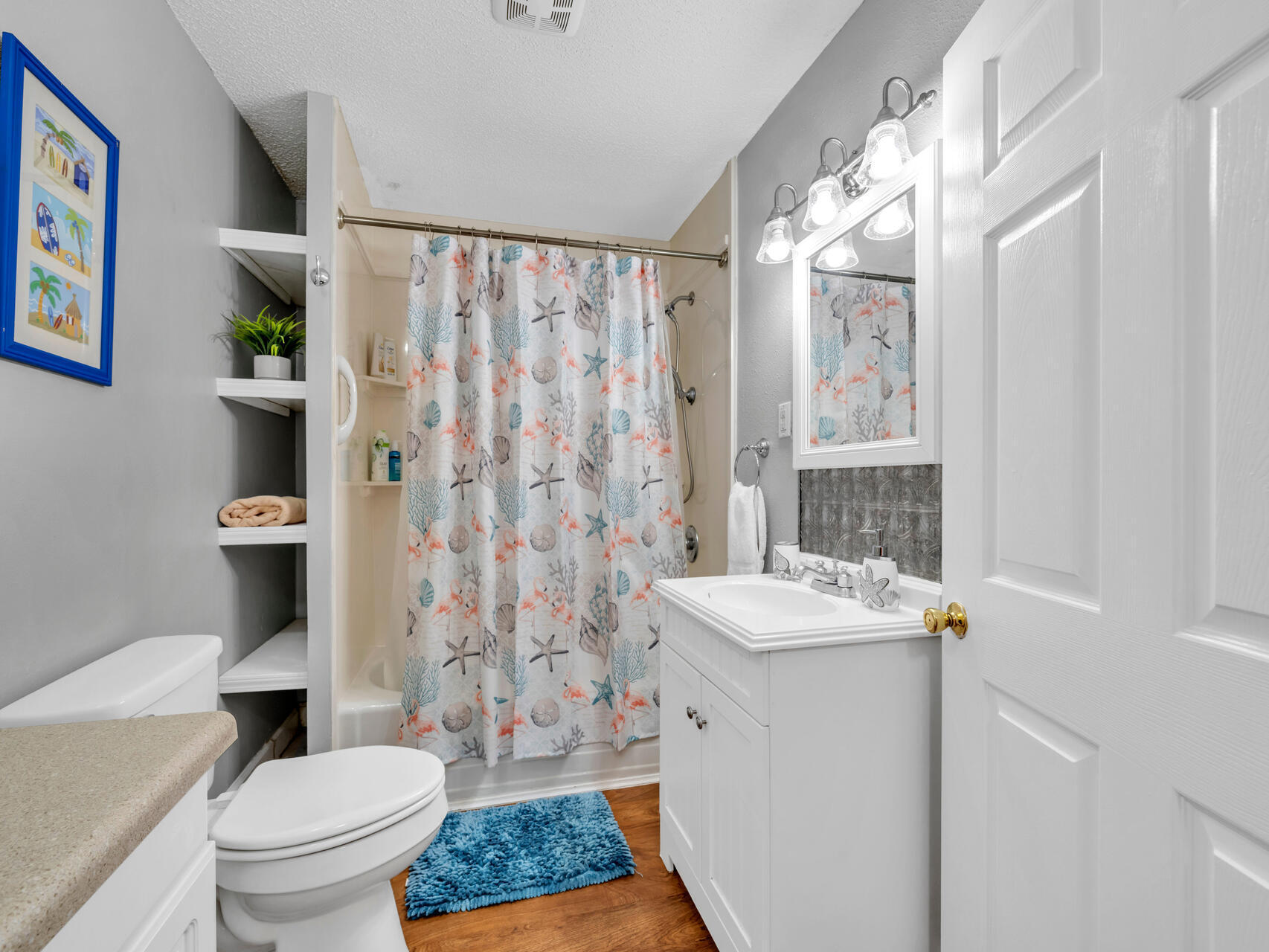 607 Alabama Street Crestview, FL 32536 - Photo 15 of 31 a bathroom with a sink toilet and shower
