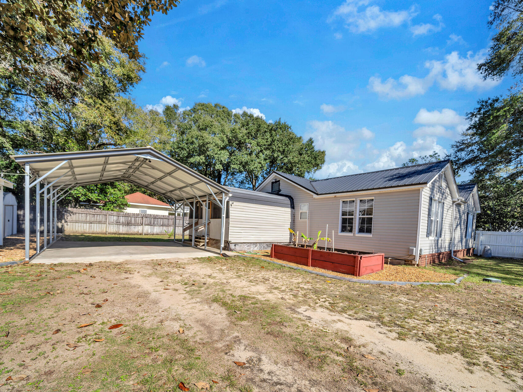 607 Alabama Street Crestview, FL 32536 - Photo 26 of 31 front view of a house with a yard