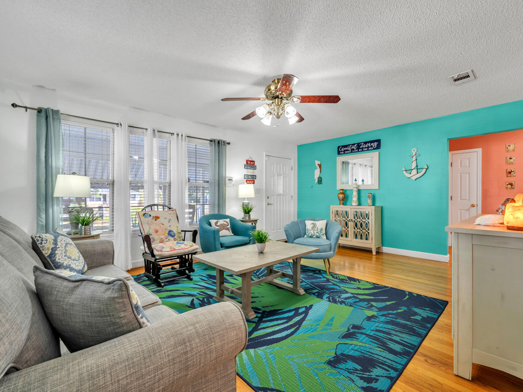 607 Alabama Street Crestview, FL 32536 - Photo 6 of 31 a living room with furniture and a large window